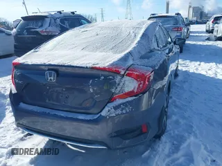 2020 Honda Civic LX z VIN 2HGFC2F64LH580766, wystawiony jako IAAI lot #41597161 z przebiegiem 10 828 mil mil oraz . Historia ofert i sprzedaży dostępna na DreamBid. Obrazek 4.