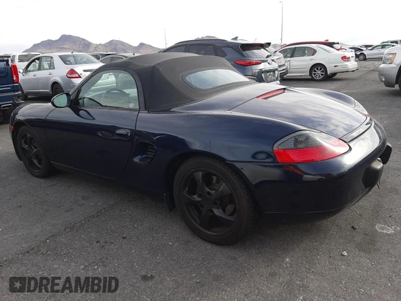 2000 Porsche Boxster z VIN WP0CA2981YU626756, wystawiony jako Copart lot #51706035 z przebiegiem 117 369 mil mil oraz Czysty tytuł • Clean title. Historia ofert i sprzedaży dostępna na DreamBid. Obrazek 2.
