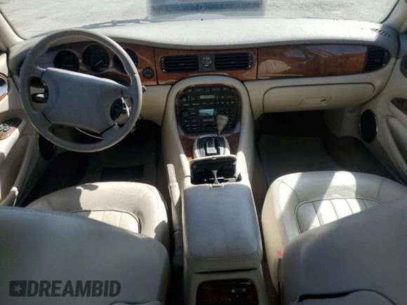 1998 Jaguar XJ with VIN SAJHX1247WC841374, listed as a Copart auction lot 51693595 with 109,509 mi miles and Clean Title. Bid and sale history available at DreamBid. Image 8.