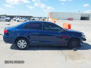 2014 Volkswagen Jetta SE z VIN 3VWD17AJ9EM402714, wystawiony jako IAAI lot #42088715 z przebiegiem 115 291 mil mil oraz . Historia ofert i sprzedaży dostępna na DreamBid. Obrazek 13.