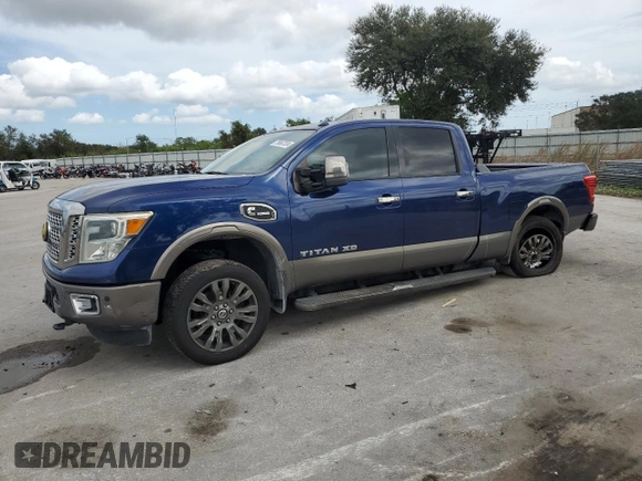 2016 Nissan Titan XD Platinum Reserve with VIN 1N6BA1F25GN503098, listed as a Copart auction lot 79867324 with 92,467 mi miles and Salvage Title. Bid and sale history available at carsss.com. Image 1.