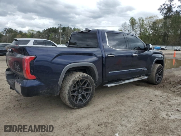 2023 Toyota Tundra 1794 Edition with VIN 5TFMA5AB7PX023918, listed as a Copart auction lot 49638235 with 58,499 mi miles and Salvage title. Bid and sale history available at DreamBid. Image 3.
