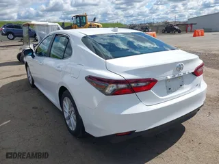 2023 Toyota Camry LE with VIN 4T1C11AK7PU135832, listed as a IAAI auction lot 41711116 with 43,115 mi miles. Bid and sale history available at carsss.com. Image 3.