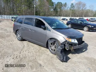 2013 Honda Odyssey EX-L with VIN 5FNRL5H62DB035649, listed as a IAAI auction lot 41849123 with 176,392 mi miles and . Bid and sale history available at carsss.com. Image 1.