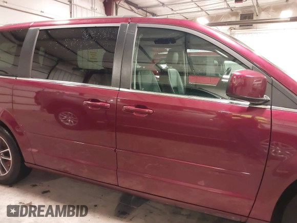 2017 Dodge Grand Caravan SXT with VIN 2C4RDGCG5HR749052, listed as a IAAI auction lot 42010625 with 118,833 mi miles and . Bid and sale history available at DreamBid. Image 13.