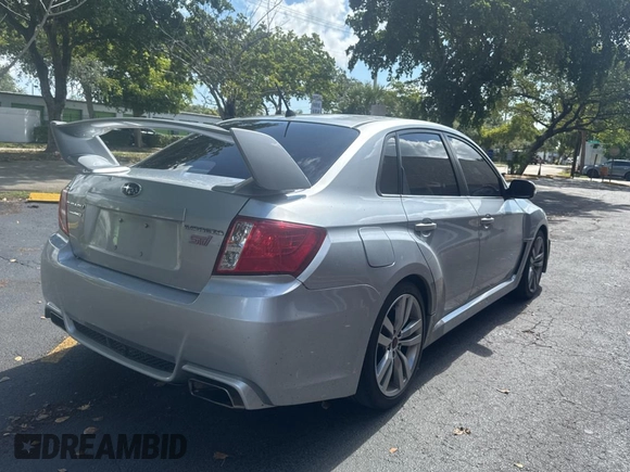 2012 Subaru WRX WRX STI with VIN JF1GV8J65CL002496, listed as a Copart auction lot 64390005 with 182,855 mi miles and Clean title. Bid and sale history available at DreamBid. Image 4.