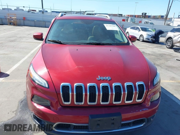 2015 Jeep Cherokee Limited with VIN 1C4PJMDB1FW599205, listed as a IAAI auction lot 41709308 with 112,415 mi miles. Bid and sale history available at carsss.com. Image 12.