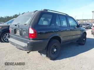 2000 Isuzu Rodeo z VIN 4S2DM58W8Y4348987, wystawiony jako IAAI lot #42024517 z przebiegiem 286 400 mil mil oraz . Historia ofert i sprzedaży dostępna na DreamBid. Obrazek 4.