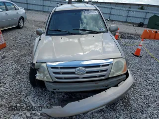 2005 Suzuki XL7 LX z VIN JS3TX92V854105506, wystawiony jako Copart lot #60683524 z przebiegiem 197 035 mil mil oraz Szkody całkowita. Historia ofert i sprzedaży dostępna na DreamBid. Obrazek 5.
