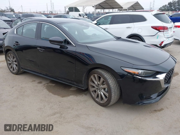 2021 Mazda 3 Premium with VIN JM1BPADL4M1329041, listed as a IAAI auction lot 42291604 with 93,248 mi miles and . Bid and sale history available at DreamBid. Image 1.