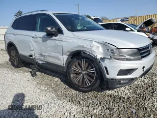 2018 Volkswagen Tiguan SEL with VIN 3VV3B7AX0JM014461, listed as a Copart auction lot 49785725 with 124,868 mi miles and Salvage Title. Bid and sale history available at DreamBid. Image 4.