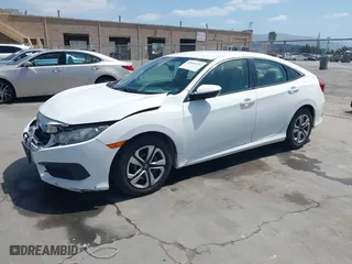 2016 Honda Civic Sedan LX with VIN 19XFC2F54GE215012, listed as a IAAI auction lot 42046334 with 146,348 mi miles. Bid and sale history available at carsss.com. Image 2.