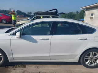 2018 Ford Fusion SE with VIN 3FA6P0HDXJR135927, listed as a IAAI auction lot 42645427 with 107,756 mi miles and . Bid and sale history available at DreamBid. Image 15.