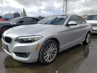 2015 BMW 2 Series 228i with VIN WBA1F5C57FV256927, listed as a Copart auction lot 41628804 with 125,695 mi miles. Bid and sale history available at carsss.com. Image 1.