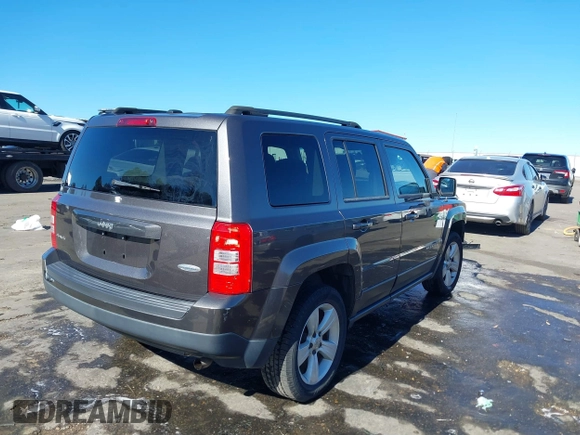 2014 Jeep Patriot Latitude with VIN 1C4NJRFB3ED886007, listed as a IAAI auction lot 41285963 with 127,007 mi miles and . Bid and sale history available at DreamBid. Image 4.