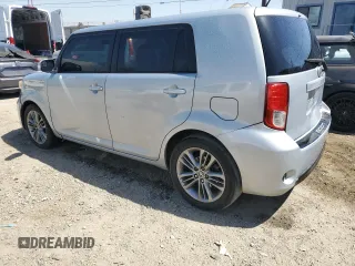 2013 Scion xB with VIN JTLZE4FE5DJ039321, listed as a Copart auction lot 52744485 with 128,536 mi miles and Salvage Title. Bid and sale history available at carsss.com. Image 2.