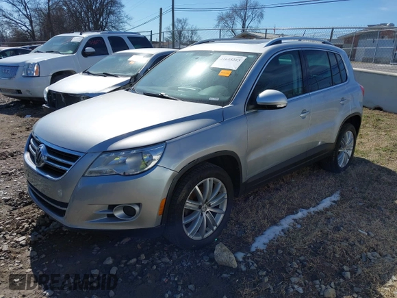 2011 Volkswagen Tiguan SE with VIN WVGBV7AX9BW509353, listed as a IAAI auction lot 41645315 with 112,283 mi miles and . Bid and sale history available at DreamBid. Image 2.
