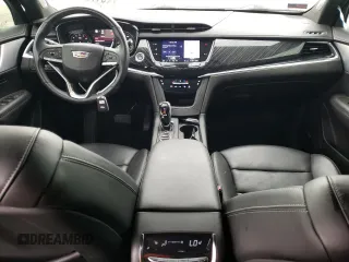 2023 Cadillac XT6 FWD Premium Luxury z VIN 1GYKPCRS5PZ101867, wystawiony jako Copart lot #51773545 z przebiegiem 31 322 mil mil oraz Szkoda całkowita • Salvage title. Historia ofert i sprzedaży dostępna na DreamBid. Obrazek 8.