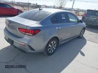2023 Kia Rio LX with VIN 3KPA24AD3PE592647, listed as a IAAI auction lot 41703960 with 16,480 mi miles. Bid and sale history available at carsss.com. Image 4.