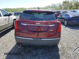 2018 Cadillac XT5 FWD with VIN 1GYKNARS1JZ205595, listed as a Copart auction lot 52428565 with 106,927 mi miles and Salvage title. Bid and sale history available at DreamBid. Image 6.