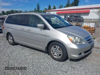 2006 Honda Odyssey EX-L z VIN 5FNRL38726B428227, wystawiony jako IAAI lot #42381464 z przebiegiem 156 623 mil mil oraz . Historia ofert i sprzedaży dostępna na DreamBid. Obrazek 1.