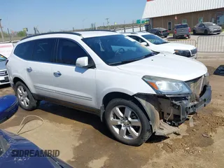 2016 Chevrolet Traverse LTZ z VIN 1GNKRJKDXGJ265413, wystawiony jako IAAI lot #42001292 z przebiegiem 157 129 mil mil oraz . Historia ofert i sprzedaży dostępna na DreamBid. Obrazek 14.
