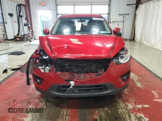 2016 Mazda CX-5 Touring with VIN JM3KE4CY0G0803265, listed as a Copart auction lot 51362065 with 84,955 mi miles and Salvage Title. Bid and sale history available at carsss.com. Image 5.