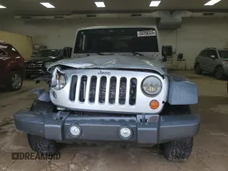2012 Jeep Wrangler Sport with VIN 1C4AJWAGXCL133013, listed as a Copart auction lot 59788325 with 141,015 mi miles and Clean title. Bid and sale history available at DreamBid. Image 5.