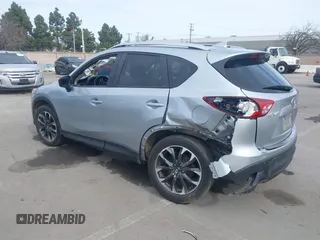 2016 Mazda CX-5 Grand Touring with VIN JM3KE2DY9G0723921, listed as a IAAI auction lot 41681522 with 83,893 mi miles. Bid and sale history available at carsss.com. Image 3.