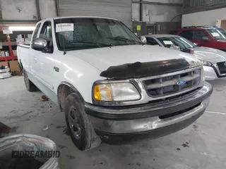 1997 Ford F-150 z VIN 1FTDX1763VKC71790, wystawiony jako IAAI lot #42209086 z przebiegiem 187 801 mil mil oraz . Historia ofert i sprzedaży dostępna na DreamBid. Obrazek 1.