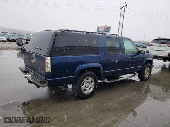 1996 Chevrolet Suburban z VIN 3GNFK16RXTG125871, wystawiony jako Copart lot #86401384 z przebiegiem 220 767 mil mil oraz Czysty tytuł • Clean title. Historia ofert i sprzedaży dostępna na DreamBid. Obrazek 3.