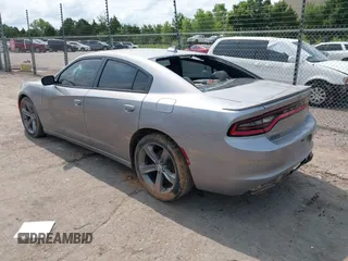 2015 Dodge Charger SXT with VIN 2C3CDXHG2FH768681, listed as a IAAI auction lot 39939245 with Not Provided miles and . Bid and sale history available at DreamBid. Image 3.