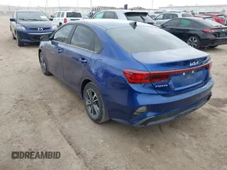 2023 Kia Forte LXS with VIN 3KPF24ADXPE573180, listed as a IAAI auction lot 41877160 with 34,876 mi miles. Bid and sale history available at carsss.com. Image 3.