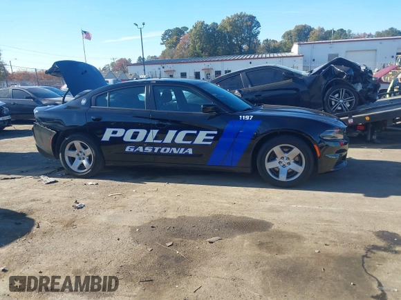 2022 Dodge Charger Police with VIN 2C3CDXAT3NH109952, listed as a IAAI auction lot 40919989 with 19,169 mi miles and . Bid and sale history available at DreamBid. Image 13.