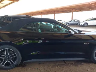 2019 Ford Mustang GT Premium z VIN 1FATP8FF7K5126175, wystawiony jako IAAI lot #42015019 z przebiegiem 91 335 mil mil oraz . Historia ofert i sprzedaży dostępna na DreamBid. Obrazek 13.