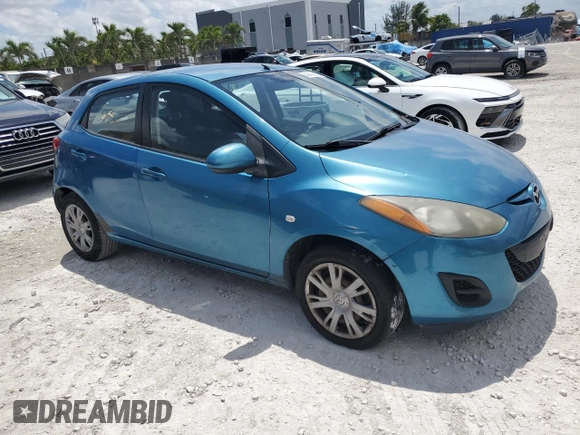 2011 Mazda 2 Sport with VIN JM1DE1HY0B0122590, listed as a Copart auction lot 56162515 with 140,847 mi miles and Clean Title. Bid and sale history available at DreamBid. Image 4.