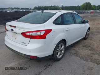 2014 Ford Focus SE with VIN 1FADP3F27EL215703, listed as a IAAI auction lot 42110523 with 179,371 mi miles. Bid and sale history available at carsss.com. Image 4.