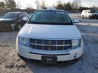 2010 Lincoln MKX z VIN 2LMDJ8JC8ABJ29917, wystawiony jako Copart lot #50023835 z przebiegiem 92 425 mil mil oraz Szkoda całkowita • Salvage title. Historia ofert i sprzedaży dostępna na DreamBid. Obrazek 5.