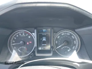 2023 Toyota Tacoma SR with VIN 3TMCZ5AN3PM590101, listed as a IAAI auction lot 42338670 with 12,970 mi miles and . Bid and sale history available at DreamBid. Image 7.
