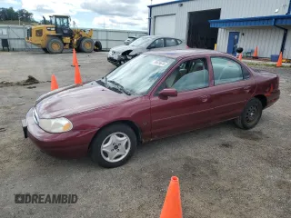 1999 Ford Contour z VIN 1FAFP653XXK231570, wystawiony jako Copart lot #70575674 z przebiegiem 120 770 mil mil oraz Tytuł czysty. Historia ofert i sprzedaży dostępna na DreamBid. Obrazek 1.