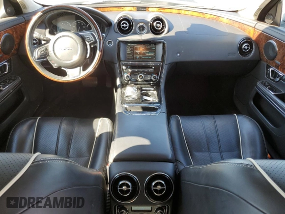 2015 Jaguar XJ with VIN SAJWA2GZ4F8V90853, listed as a Copart auction lot 72631114 with 59,237 mi miles and Salvage Title. Bid and sale history available at carsss.com. Image 8.