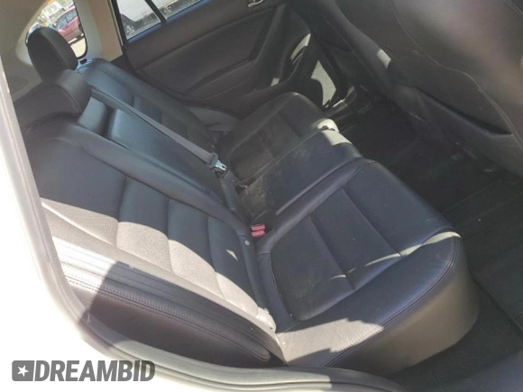 2014 Mazda CX-5 Grand Touring with VIN JM3KE4DY2E0354795, listed as a Copart auction lot 54205775 with 62,939 mi miles and Salvage Title. Bid and sale history available at DreamBid. Image 11.