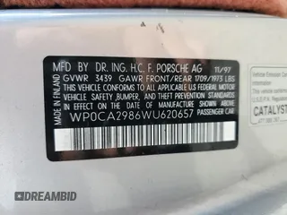 1998 Porsche Boxster z VIN WP0CA2986WU620657, wystawiony jako Copart lot #55595275 z przebiegiem 78 711 mil mil oraz Szkoda całkowita • Salvage title. Historia ofert i sprzedaży dostępna na DreamBid. Obrazek 12.