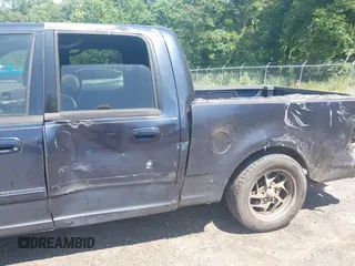 2001 Ford F-150 XLT с VIN 1FTRW07L41KA09067, выставлен на аукционе IAAI как лот 42459211 с пробегом 269 113 миль миль и . История ставок и продаж доступна на DreamBid. Изображение 6.
