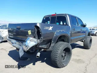 2014 Toyota Tacoma PreRunner with VIN 3TMJU4GN3EM165840, listed as a IAAI auction lot 41666871 with 150,333 mi miles and . Bid and sale history available at DreamBid. Image 6.