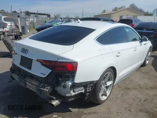2019 Audi A5 Sportback Premium with VIN WAUDNCF55KA023971, listed as a IAAI auction lot 41590436 with 78,824 mi miles. Bid and sale history available at carsss.com. Image 4.