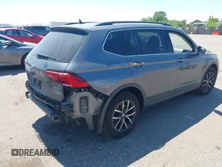 2019 Volkswagen Tiguan SE with VIN 3VV2B7AX3KM143968, listed as a IAAI auction lot 39838788 with 155,823 mi miles and . Bid and sale history available at DreamBid. Image 4.