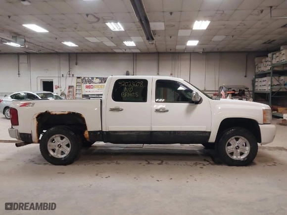 2007 Chevrolet Silverado 1500 LT w/2LT with VIN 2GCEK13MX71677513, listed as a IAAI auction lot 42023608 with 144,555 mi miles. Bid and sale history available at carsss.com. Image 13.