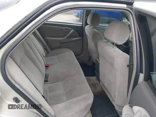 2001 Toyota Camry LE z VIN 4T1BF22K61U126600, wystawiony jako IAAI lot #42175093 z przebiegiem 294 276 mil mil oraz . Historia ofert i sprzedaży dostępna na DreamBid. Obrazek 8.
