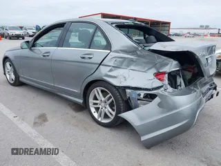 2014 Mercedes-Benz C 250 Sport with VIN WDDGF4HB6EG160494, listed as a IAAI auction lot 42310423 with 145,160 mi miles and . Bid and sale history available at DreamBid. Image 3.